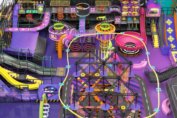 Adventure-themed indoor playground with climbing structures, slides and challenging activities for older children and teenagers