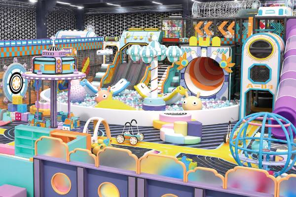 Colorful indoor playground theme with soft play areas and imaginative activities for younger children