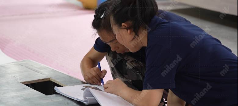 Miland after-sales service team providing onsite inspection and support for an indoor playground project